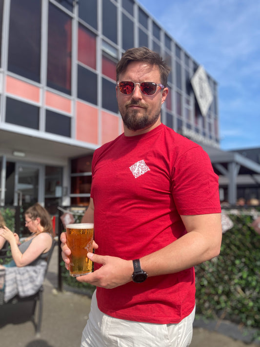 Man In Sunglasses Wearing Red Kirkstall Logo T-Shirt Holding Pint Of Beer