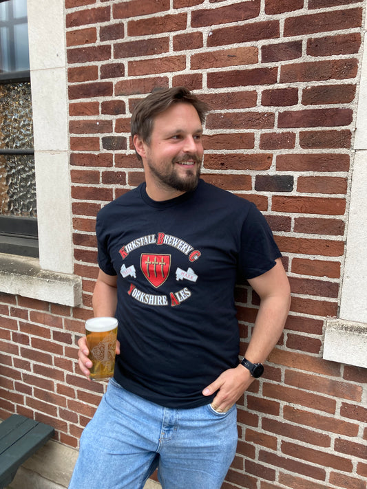 Man Wearing Yorkshire Ales Black T-Shirt Holding Pint Of Beer