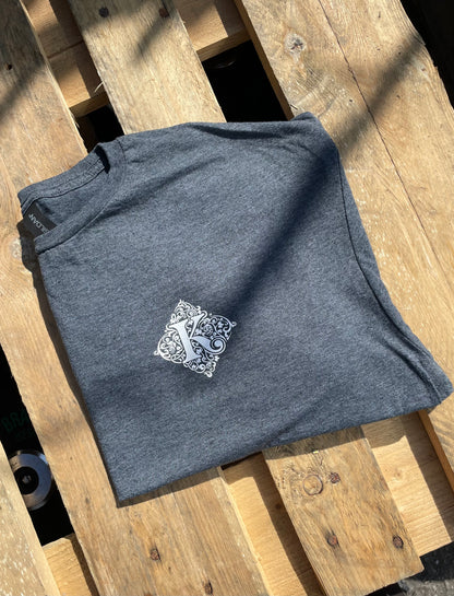 Folded Charcoal Grey T-Shirt With Kirkstall Logo On Wooden Pallet